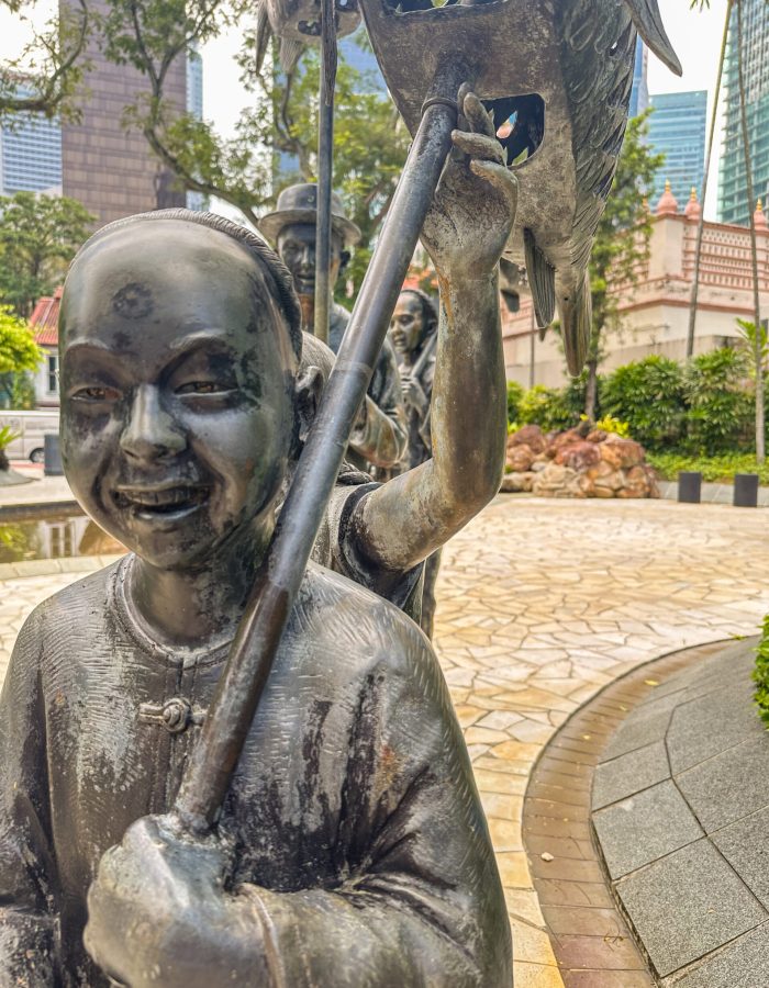 Beelden bij Telok Ayer Street in Chinatown Singapore